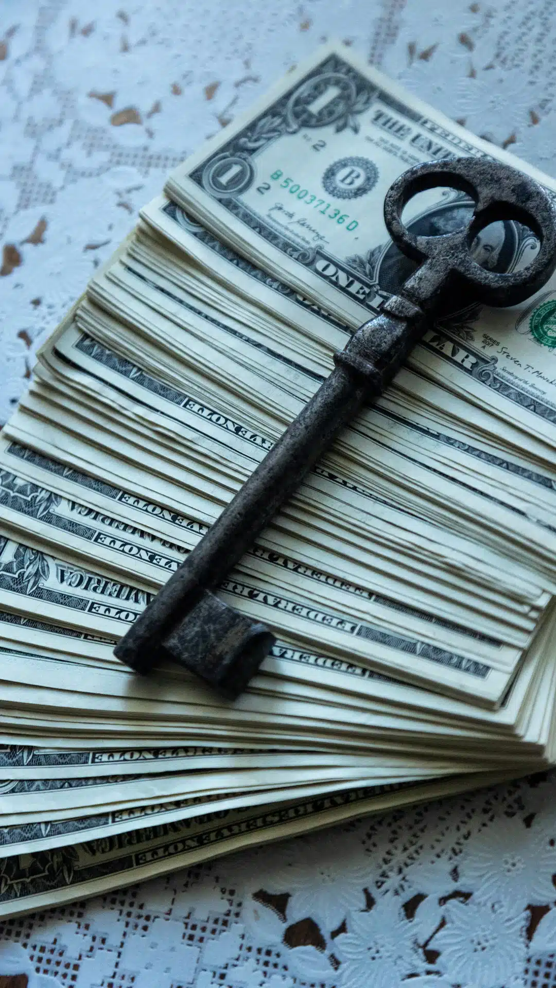 A bunch of money sitting on top of a table